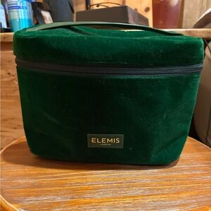 Elemis London faux green cosmetics or skincare products bag